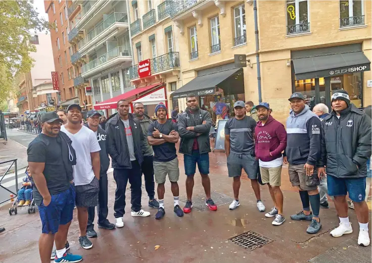  ?? Photo: J Boots ?? Fiji Airways Flying Fijians reps in Toulouse France, on November 3,2018. They are preparing to play Scotland early Sunday morning (Fiji time) in Edinburgh (left-right) Mesulame Vugakoto, Eroni Mawi, Alivereti Veitokani, Mosese Voka, Vereniki Goneva, Frank Lomani, Albert Tuisue, Fijian supporter, Henry Seniloli, Veremalua Vugakoto, Joeli Veitayaki.