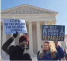  ?? MATTHEW SOBOCINSKI/USA TODAY ?? Public-school supporters protest at the Supreme Court on Wednesday.