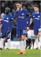  ?? — GETTY IMAGES ?? Chelsea’s Eden Hazard looks dejected after a 1-1 tie against West Ham.