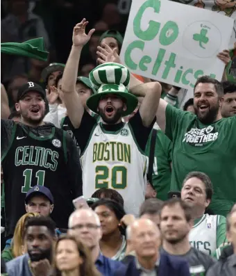  ?? Herald STaFF File ?? LITTLE GARDEN PARTY: Fans cheer on the Celtics as they take on the Pacers during a first-round playoff series at TD Garden on April 14, 2019. A percentage of fans will be welcomed back to the Garden beginning with the Celtics game against the Pelicans on March 29.