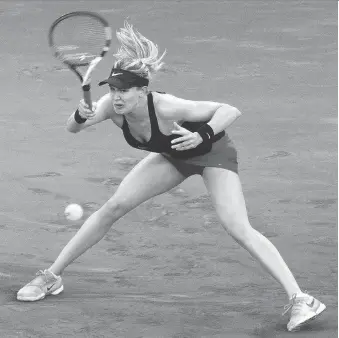  ?? PAUL WHITE/THE CANADIAN PRESS ?? Canadian Eugenie Bouchard has been forced to withdraw from the Nuremberg Cup tournament in Germany after an MRT scan revealed she tore a ligament in her ankle while training.