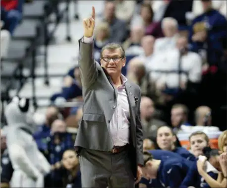  ?? THE ASSOCIATED PRESS ?? UConn (32-0) enter the NCAA Tournament as the lone unbeaten team and went wire-to-wire as the unanimous top team. They received all 32 votes from the national media panel Monday.