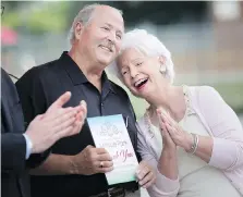  ??  ?? Rick Farrow, who pledged $500,000 to the new baseball complex, shares a laugh with Ward 6 Coun. Jo-Anne Gignac on Wednesday.