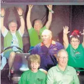  ?? COURTESY OF DISNEY PARKS ?? Mickey’s Fanatics members cheer as they ride the Tower of Terror attraction at Disney's Hollywood Studios.