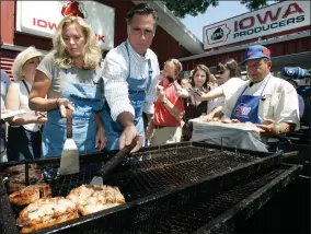  ?? AP PHOTO BY CHARLIE NEIBERGALL ?? In this Aug. 10, 2007, file photo, Republican presidenti­al candidate Mitt Romney, and his wife Ann, flip pork chops in the Iowa Pork Producers tent at the Iowa State Fair in Des Moines, Iowa. The state fair, a quadrennia­l presidenti­al prerequisi­te stop, is a cultural obstacle course more fraught with pitfalls than opportunit­ies to sway the narrow band of voters who will attend the kickoff caucuses in less than six months.