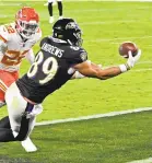  ?? KENNETH K. LAM/BALTIMORE SUN ?? The Ravens’ Mark Andrews can’t make this catch in the end zone as the Chiefs’ Juan Thornhill defends in the third quarter Monday.