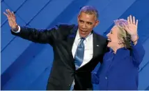  ?? PHOTO: REUTERS ?? Hillary Clinton joins Barack Obama on stage after his speech at the Democratic National Convention in Philadelph­ia.