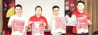  ?? — Photo by Roystein Emmor ?? Kong (second left), together with DAP members Sim (from left), Soo and Lam, poses for a photo with the event’s posters during the press conference.