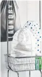  ??  ?? Laundry: Part of growing up is doing your own laundry. Keep it tidy in a pop-up hamper, $7.99, or novelty laundry bags, $5.99 at Bed, Bath & Beyond.