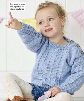  ??  ?? This warm, roomy knit is perfect for winter playtimes