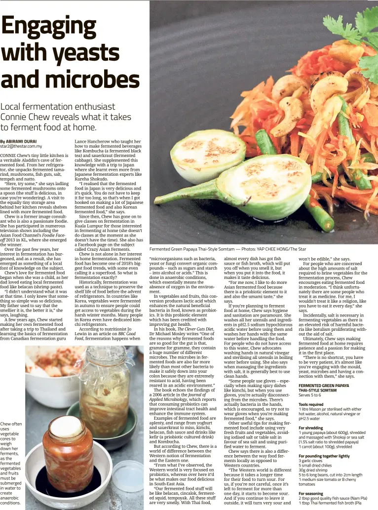  ?? — Photos: YAP CHEE HONG/The Star ?? Chew often uses vegetable cores to weigh down her ferments, as the fermented vegetables and fruits must be submerged in water to create anaerobic conditions. Fermented Green Papaya Thai-Style Somtam