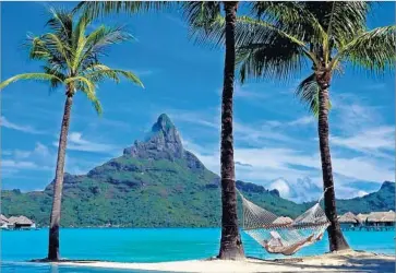  ?? An Amlotte Los Angeles Times ?? YOU CERTAINLY shouldn’t bail on your job to retire early before you’ve had a fee-only financial planner look at your situation and see if your plans are realistic. Above, a resort in Bora Bora, French Polynesia.