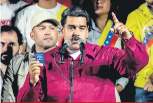  ?? Juan Barreto/AFP ?? Nicolás Maduro, 55, foi reeleito neste domingo para um novo mandato de seis anos