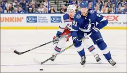  ?? Andy Lyons / Getty Images ?? Steven Stamkos of the Tampa Bay Lightning skates down the ice with the puck to score a goal on Igor Shesterkin (not pictured) of the New York Rangers in Game Six of the Eastern Conference Final of the 2022 Stanley Cup Playoffs at Amalie Arena on Saturday in Tampa, Florida.