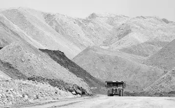  ?? — Reuters photo ?? Dump trucks haul coal and sediment at the Black Butte coal mine outside Rock Springs, Wyoming, US. The US Department of Energy has thrown a lifeline to the struggling US coal and nuclear industries by proposing a new rule that would explicitly...