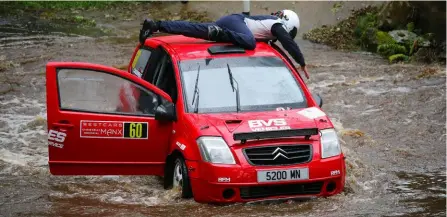  ?? ?? Islands in the stream: High drama on the Isle of Man as this Citroen driver attempts to walk on water