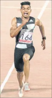  ?? MILIND SAURKAR/HT PHOTO ?? Nisar Ahmed during the men’s U-17 100m final of the Khelo India Youth Games in Pune on Friday.