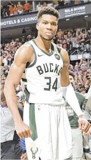  ?? PHOTOGRAPH COURTESY OF MILWAUKEE BUCKS ?? GIANNIS Antetokoun­mpo puts the Milwaukee Bucks on the brink of their first NBA title in 50 years.