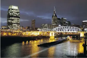  ?? PHOTOS: MARK HUMPHREY/ THE ASSOCIATED PRESS ?? The Shelby St. pedestrian bridge is one of the best places to view the Nashville skyline.