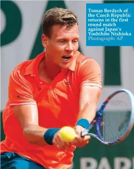  ?? Photograph: AP ?? Tomas Berdych of the Czech Republic returns in the first round match against Japan’s Yoshihito Nishioka