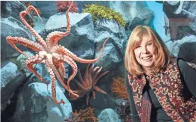  ?? TNS ?? Children's author Jan Brett hangs out with Gilligan, a giant Pacific octopus, at Aquarium of the Pacific in Long Beach, Calif., in December.