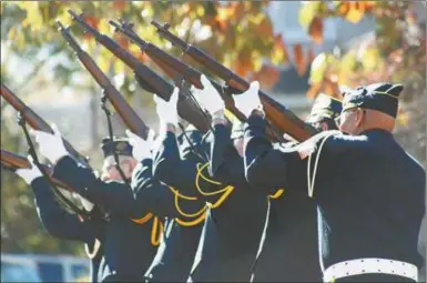  ??  ?? The American Legion honor guard fires off the third volley in a 21-gun salute during Cedartown’s ceremony for Veteran’s Day.