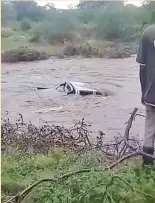  ??  ?? SUBMERGED:
The barely visible bakkie