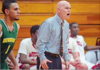  ?? DAY FILE PHOTO ?? Mitchell College men’s basketball Todd Peretz, who is currently sharing the school’s athletic director duties, is adjusting to the daily challenges associated with the coronaviru­s crisis.