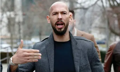  ?? ?? Andrew Tate speaks to reporters while leaving court in Bucharest in February. Photograph: Robert Ghement/EPA