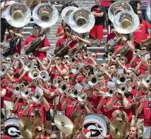  ?? AJC FILE PHOTO 2017 ?? At UGA, the Redcoat Marching Band has played the slow, dramatic “Tara’s Theme” for decades as fans filed out of the stadium whether the Bulldogs won or lost, but no more.