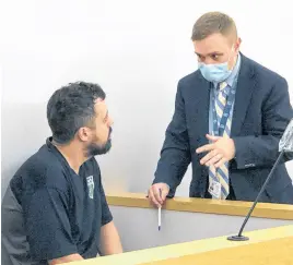  ?? TELEGRAM PHOTO ?? Duty council Dan Furey (right) speaks with Justin Haynes in provincial court in St. John’s on Wednesday, Sept. 14.