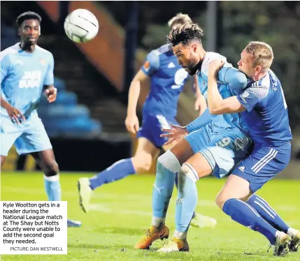  ?? PICTURE: DAN WESTWELL ?? Kyle Wootton gets in a header during the National League match at The Shay but Notts County were unable to add the second goal they needed.