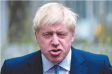  ?? AP PHOTO ?? Britain’s Prime Minister Boris Johnson appears Friday at West Midlands Police Learning and Developmen­t Centre in Birmingham, England.