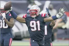  ?? CHARLES KRUPA — THE ASSOCIATED PRESS ?? Patriots defensive lineman Deatrich Wise Jr. celebrates after recovering a fumble in the end zone for a touchdown in the second half of a game against the Raiders in Foxborough on Sept. 27.