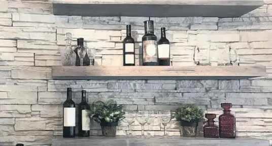  ?? Photo courtesy of Content That Works ?? A home bar can be integrated anywhere, even on existing shelving.