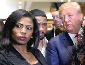  ?? GETTY IMAGES ?? Omarosa Manigault Newman appears alongside then-presidenti­al hopeful Donald Trump during a press conference in 2015.