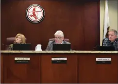  ?? Brennon Dixson/The Signal ?? Members of the William S. Hart Union High School District Governing Board Vicki Engbrecht, left, Steven Sturgeon and Robert Jensen, Jr. sit during a meeting. The district currently has on the agenda 20 new courses for ESL students, specifical­ly...