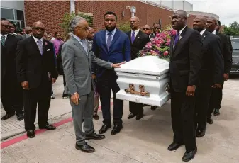  ?? Godofredo A Vásquez / Staff photograph­er ?? The Rev. Al Sharpton, who eulogized Pamela Turner, touches her casket before it’s placed into the hearse following the funeral service at Lilly Grove Missionary Baptist Church.