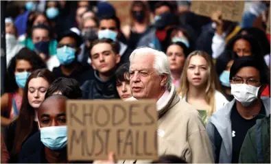  ?? Pictures: STEVE REIGATE, VICTORIA JONES/PA, HANNAH MCKAY/REUTERS & ROWAN GRIFFITHS ?? BBC world affairs editor John Simpson joined the crowd of around 1,000 people in Oxford yesterday