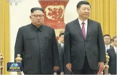  ?? AP ?? Chinese President Xi Jinping welcomes North Korean leader Kim Jong-un to the Great Hall of the People in Beijing