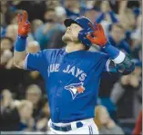  ?? The Canadian Press ?? Toronto Blue Jays’ Josh Donaldson celebrates his solo home run during sixth-inning American League action in Toronto on Monday.