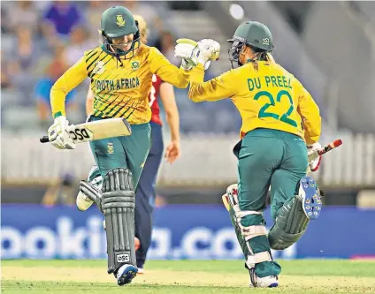  ??  ?? Touch of class: Mignon du Preez celebrates scoring South Africa’s winning runs with Sune Luus (above), while Sophie Ecclestone faces defeat (below)