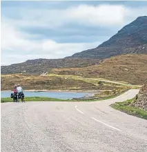  ?? ?? ● Cyclists stop to enjoy the view on North Coast 500