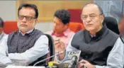  ?? PTI ?? FM Arun Jaitley (right) and revenue secretary Hasmukh Adhia after the meeting of the GST Council, in New Delhi on Friday