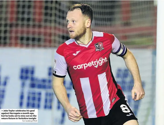  ?? Tom Sandberg/PPAUK ?? Jake Taylor celebrates his goal against Harrogate a month ago, but he looks set to miss out on the return fixture in Yorkshire tonight