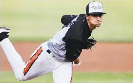  ?? STEVE RUARK/BALTIMORE SUN MEDIA GROUP ?? Aberdeen IronBirds starting pitcher Blaine Knight delivers to the Vermont Lake Monsters in the first inning of a New York-Penn League baseball game in 2019 in Aberdeen.