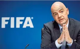  ??  ?? FIFA- Präsident Infantino: Befürworte­r der Dreier- Bewerbung