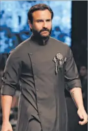  ??  ?? Actor Saif Ali Khan on the runway during the show