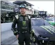  ?? DARRON CUMMINGS - THE ASSOCIATED PRESS ?? Kurt Busch walks in the pits before qualificat­ions for the NASCAR Series auto race at Indianapol­is Motor Speedway, Sunday, Aug. 15, 2021, in Indianapol­is.