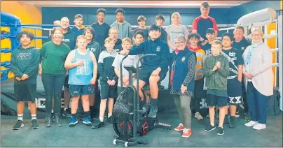  ?? Photo / Supplied ?? Rosetown Lions president Paula McWha (centre right) and youth chair Johanna Tong (right) donate a high-powered exercycle to the Te Awamutu Boxing Academy.